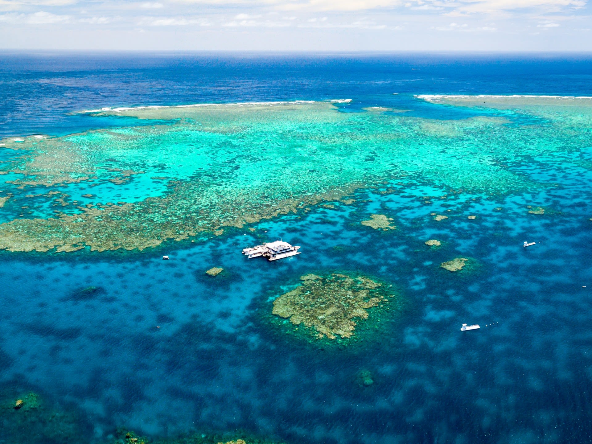 Quicksilver boat and pontoon at Agincourt Reef off Port Douglas