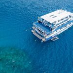 OceanQuest liveaboard boat moored above the Great Barrier Reef