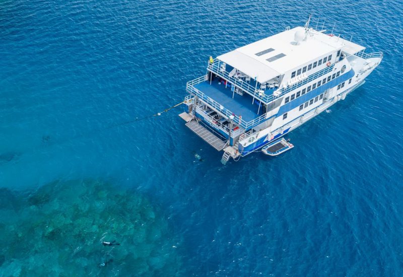 OceanQuest liveaboard boat moored above the Great Barrier Reef