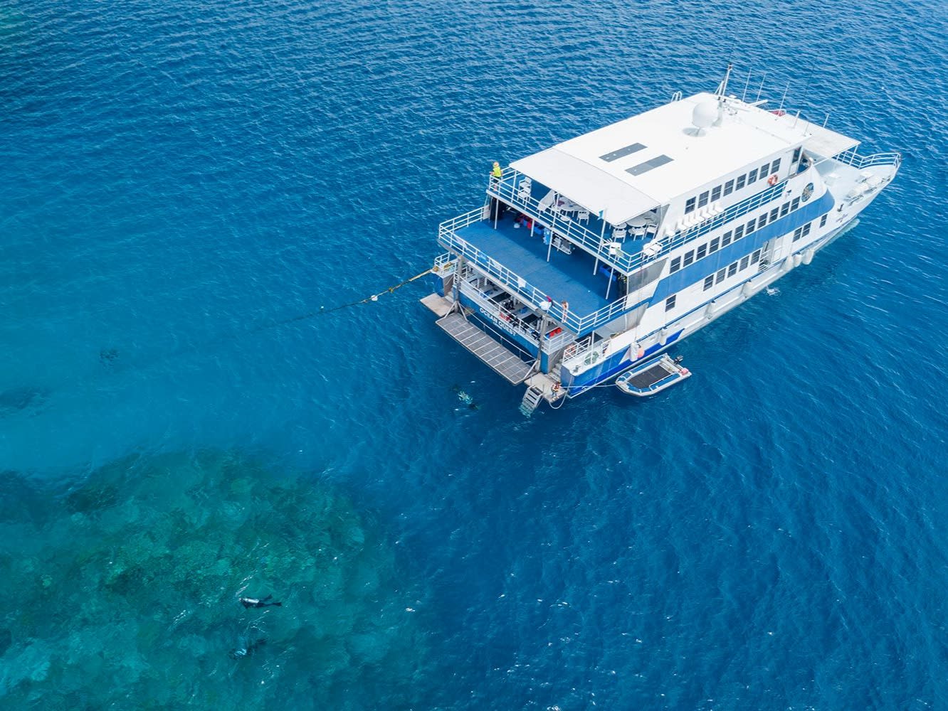 OceanQuest liveaboard boat moored above the Great Barrier Reef
